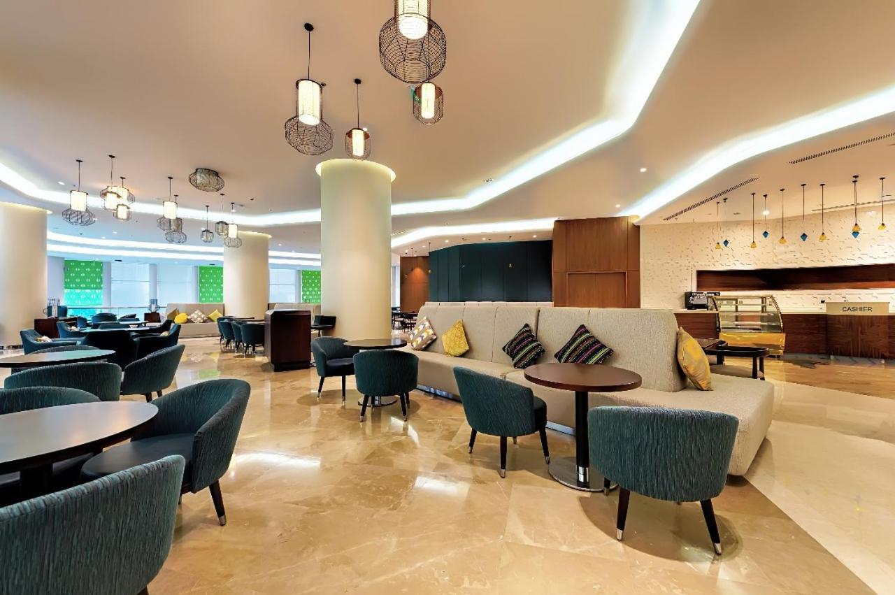 Holiday Suites Al Azizia Мекка Экстерьер фото The hotel's lobby
